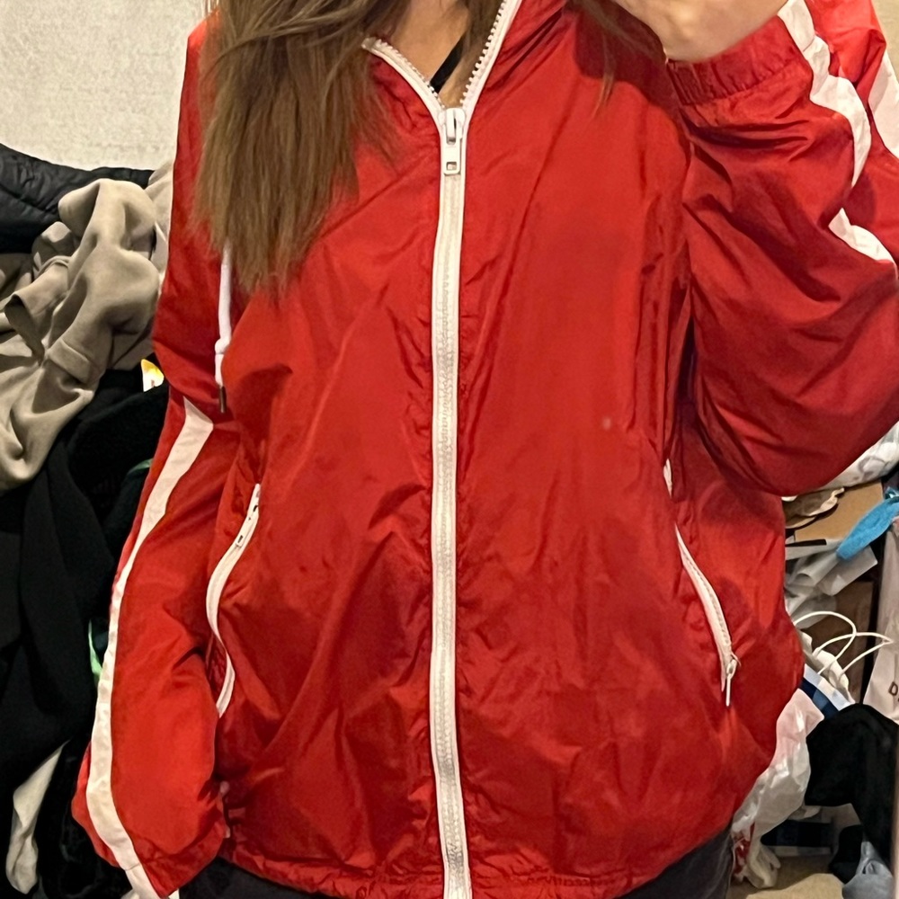 red windbreaker